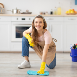 housekeeper cleaning floor