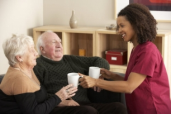 caregiver attending to seniors