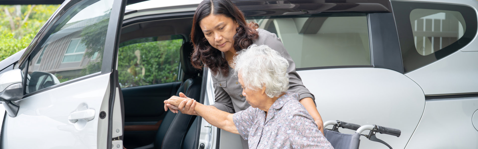 woman transporting senior with vehicle