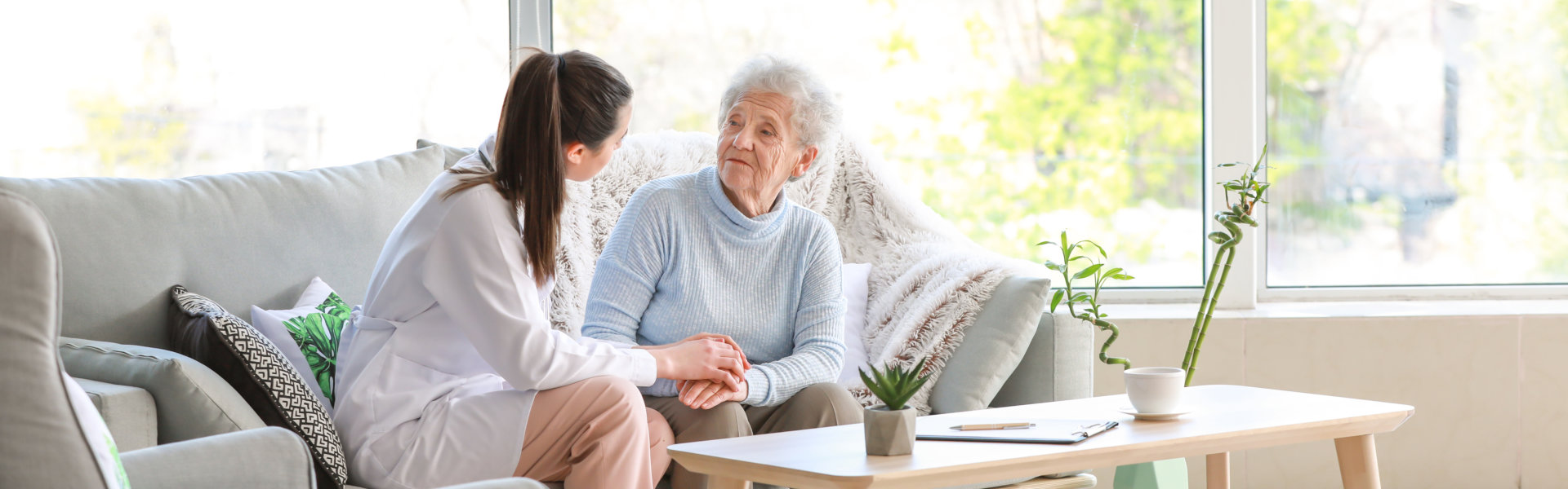 woman talking to senior